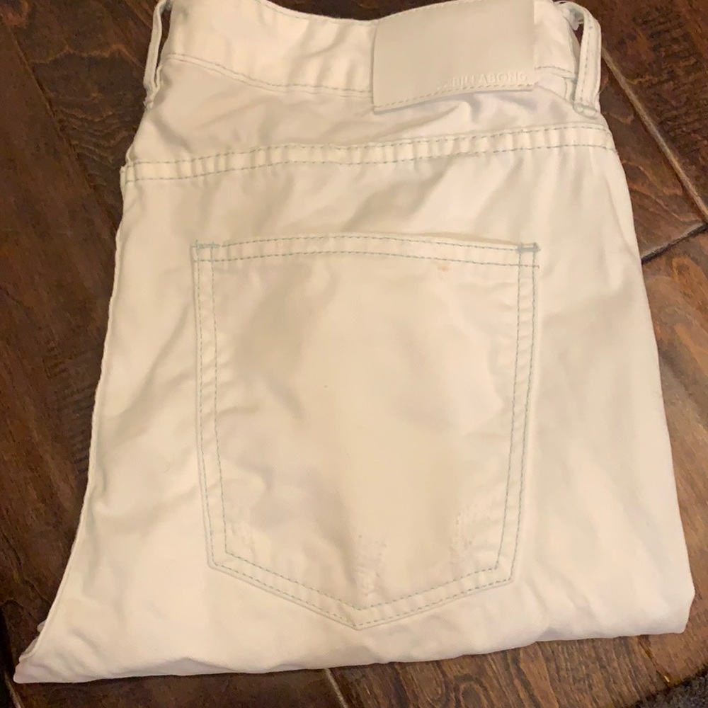 White Cotton jeans with blue threading … billabong size 26/.   27in inseam